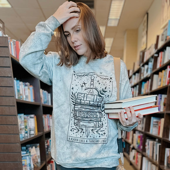 A Reader Lives a Thousand Lives Distressed Sweater
